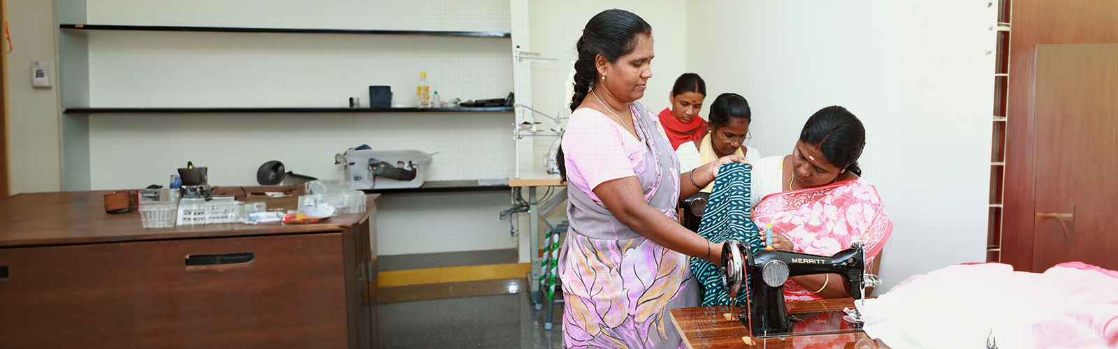 Woman teaching tailoring
